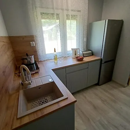 Letniskowe Cztery Pory Roku Деревянный коттедж