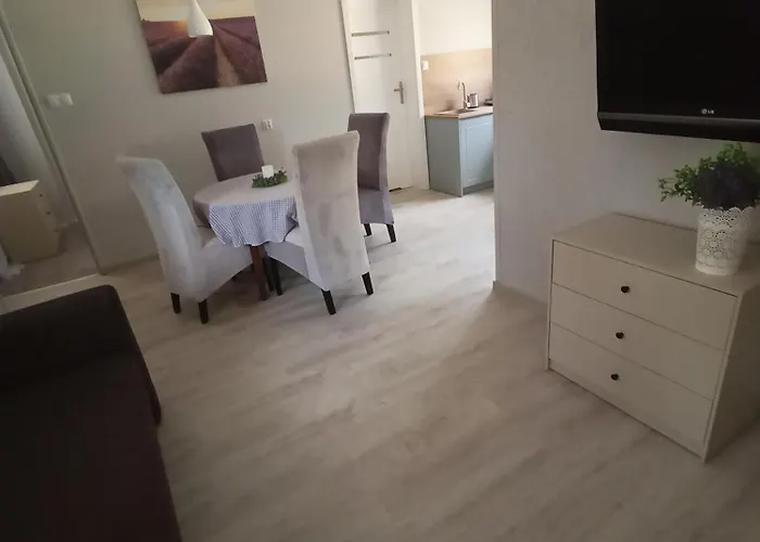 Деревянный коттедж Letniskowe Cztery Pory Roku